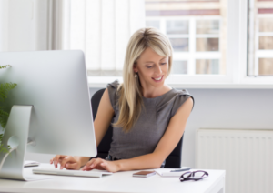 A woman working at a computer