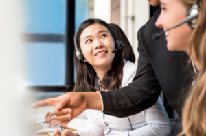 Two women making sales calls