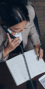 A woman making a phone call